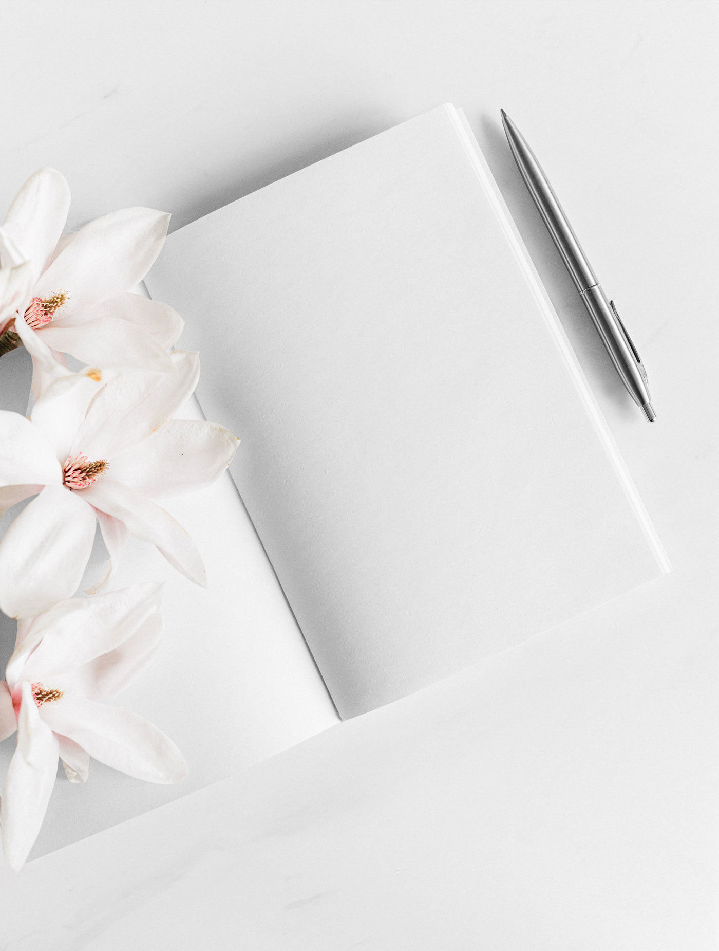 Top View of Artistic Notebook Mockup with Flowers FREE PSD