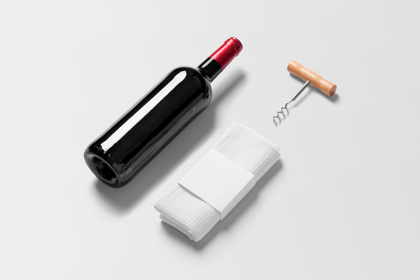 Top View of Lying Wine Bottle Mockup with Dishcloth FREE PSD