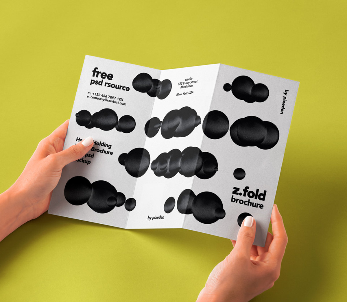 Front View of Hand-holding 3Fold Brochure Mockup FREE PSD
