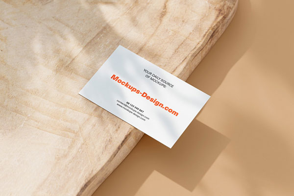 Various Views of 4 Business Cards Mockups on Piece of Wood FREE PSD