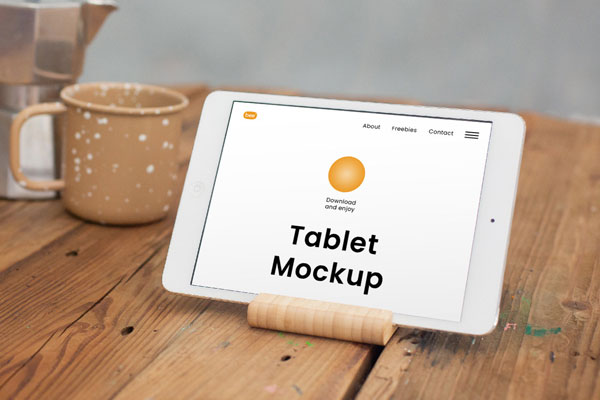 Perspective sight of Tablet Mockup with Cup FREE PSD