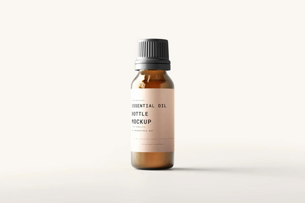 5 Large Essential Oil Bottle Mockups in Different Views FREE PSD