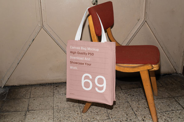 Perspective Sight of Canvas Bag Mockup Hanging on Chair FREE PSD
