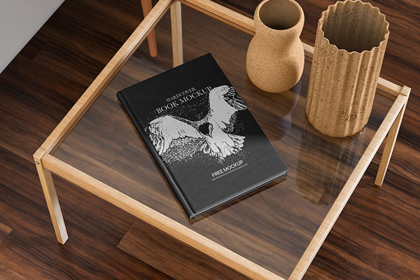 Perspective Sight of Hardcover Book Mockup on Table FREE PSD