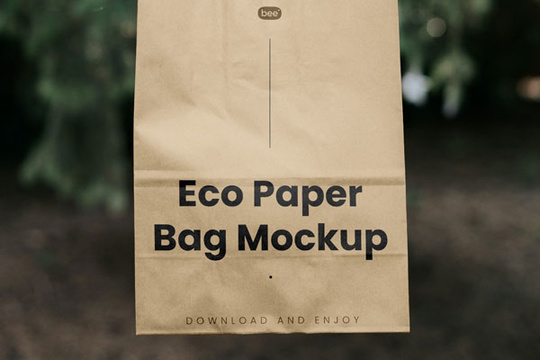 Facing Showcase of Paper Bag Mockup in Hand FREE PSD