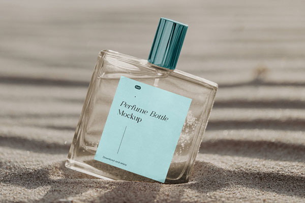 Transparent Perfume Bottle Mockup on Sunny Beach FREE PSD