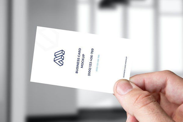 Hand Holding Business Card Mockup in Facing Sight FREE PSD