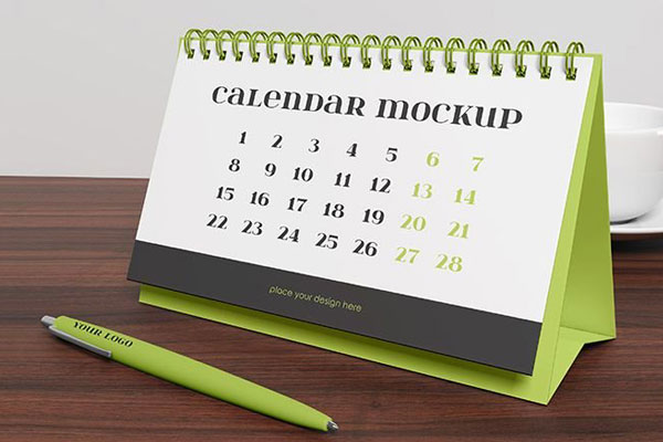 Perspective Sight of Desk Calendar Mockup with a Pen FREE PSD