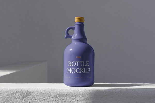 Ceramic Bottle Standing on Concrete Mockup in Front Angle FREE PSD