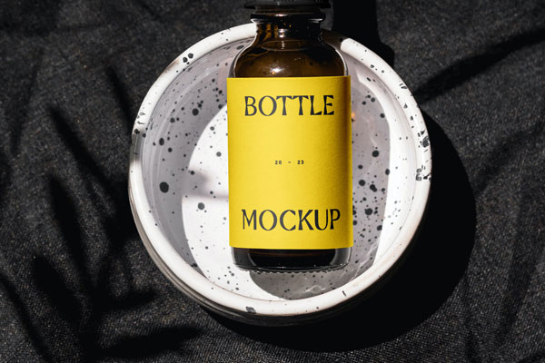 Facing View of Cosmetic Bottle Mockup FREE PSD