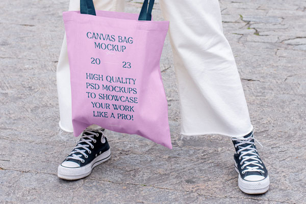 Perspective View of Fashion Canvas Bag Mockup in Hands FREE PSD