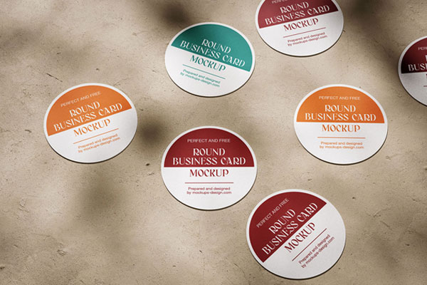 5 Mockups of Circle Business Cards on Concrete Floor FREE PSD