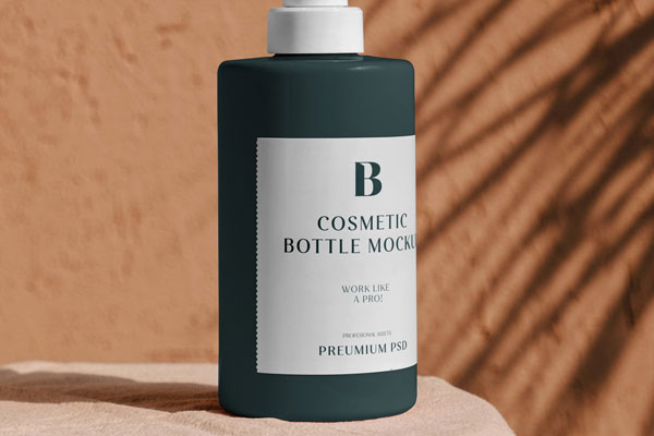 Bottle with Dispenser Mockup on Rock FREE PSD