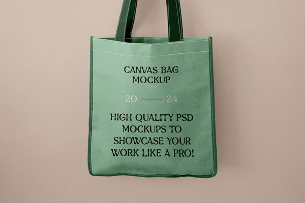 Front View of Canvas Shopping Bag Mockup in Hand FREE PSD