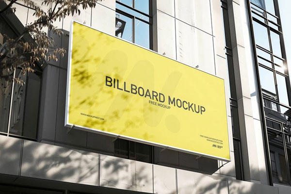 Low-Angle View of Billboard Mockup on the Building FREE PSD