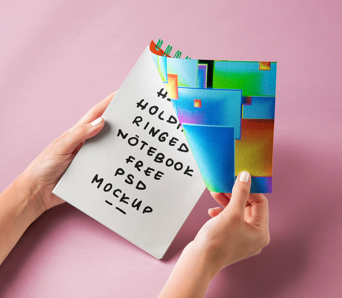 Free Facing View of Hand Holding Ringed Notebook Mockup PSD Template