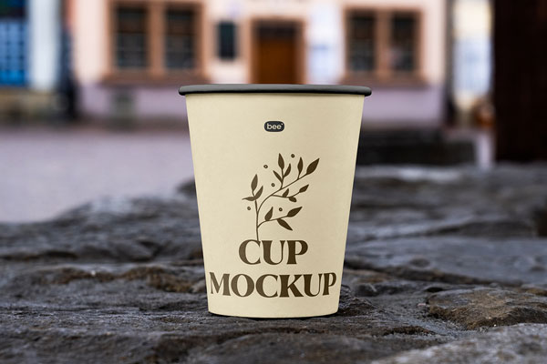 Free Facing View of Open Paper Cup Mockup on Wall PSD Template