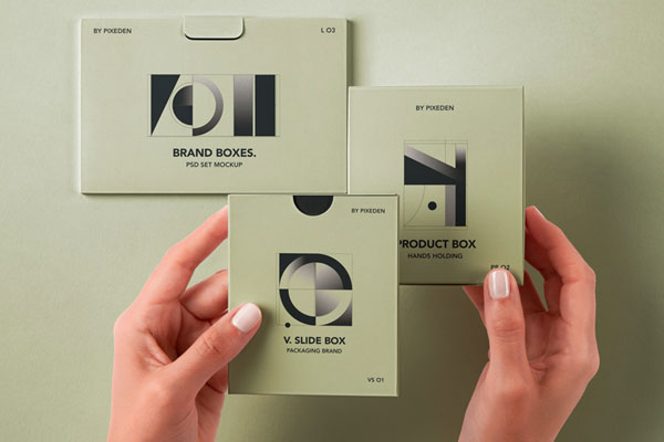 Free Hands Holding Product Boxes Mockup in Top Sight PSD Template