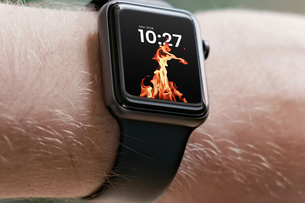 Free Apple Watch on Man Wrist Mockup PSD Template