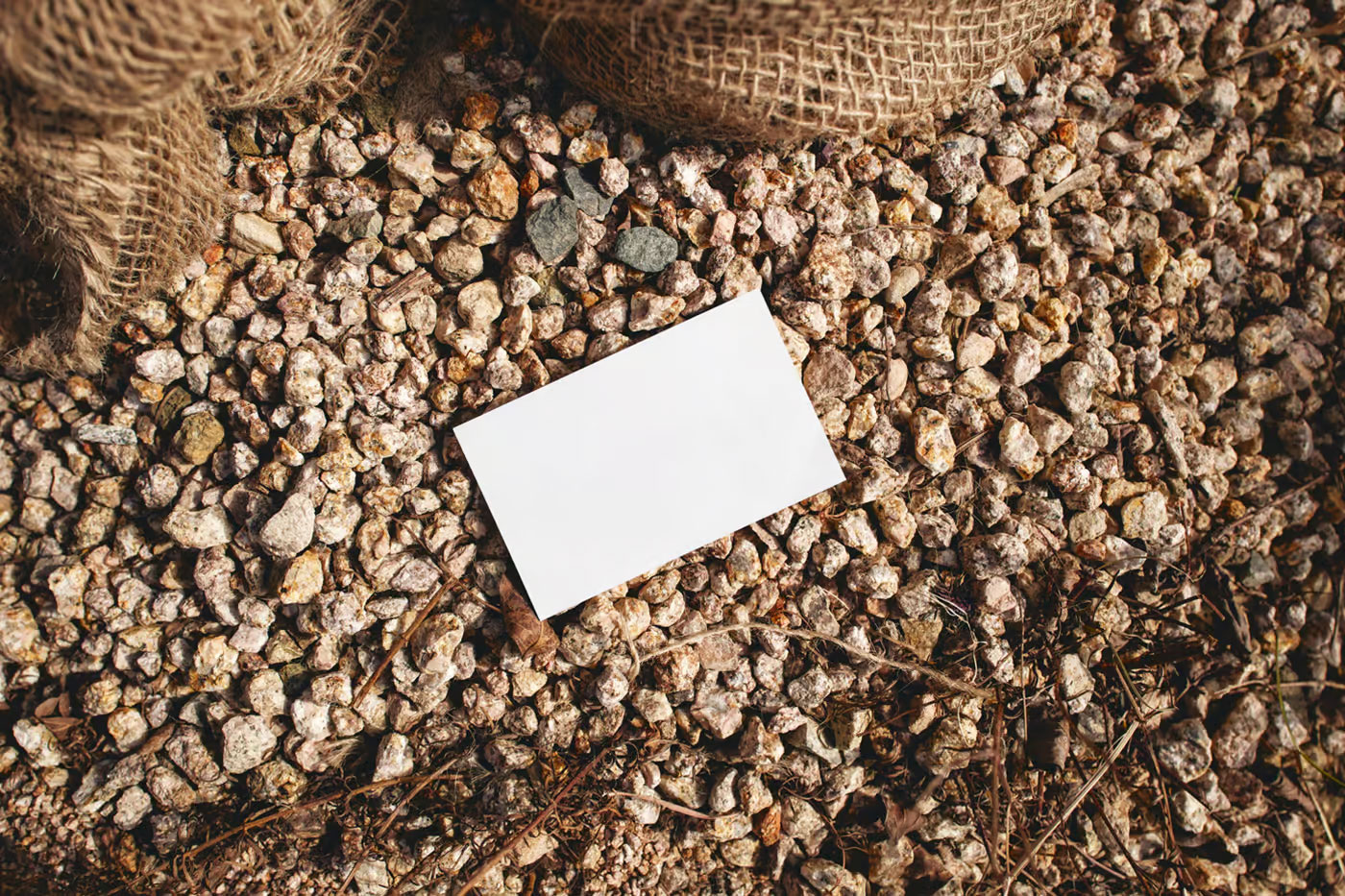 Free Business Card Laying on Stones Mockup PSD Template