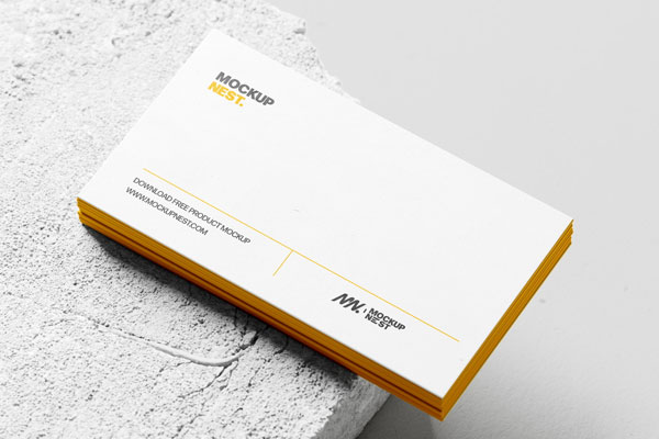 Free Business Card Mockup Stacked on Concrete PSD Template
