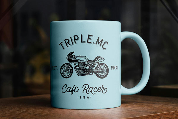 Free Ceramic Mug on Table Mockup PSD Template