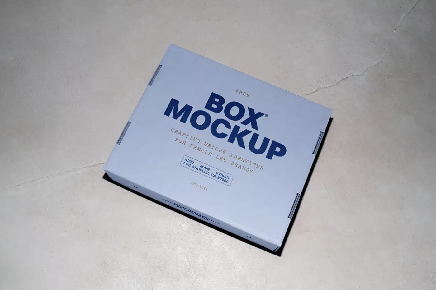 Free Cardboard Box on Floor Mockup PSD Template