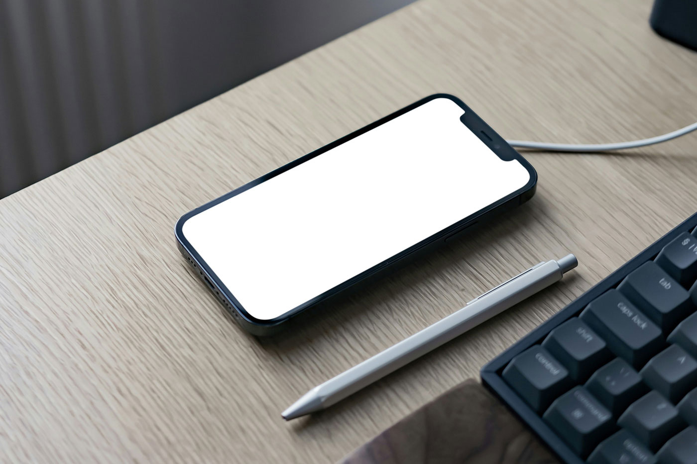 Free iPhone on Charger Mockup PSD Template