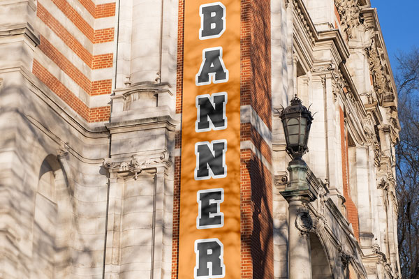 Free Long Vertical Banner on Wall Mockup PSD Template