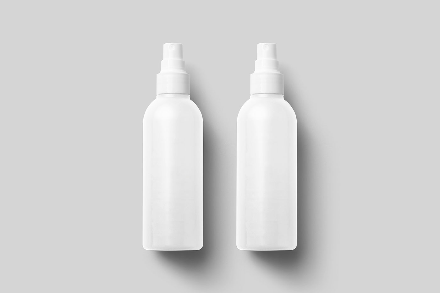 Free Lying Cosmetic Spray Bottle Mockup PSD Template