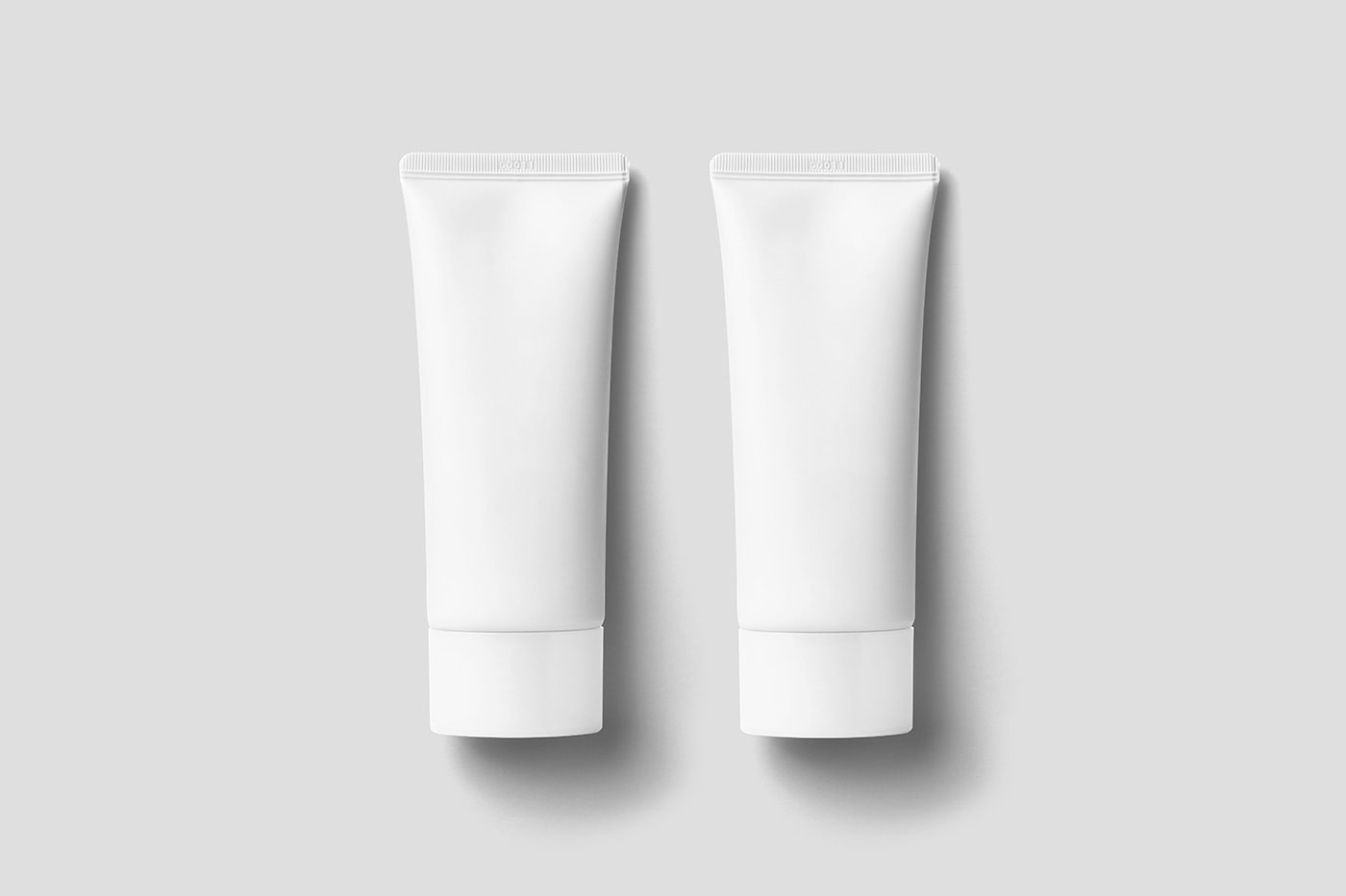 Free Lying Cosmetic Tube Mockup PSD Template