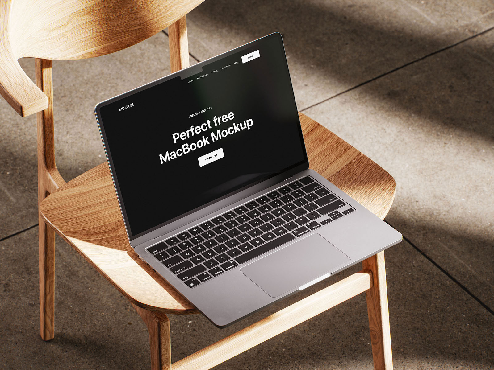 Free MacBook Mockup on Wooden Chair PSD Template