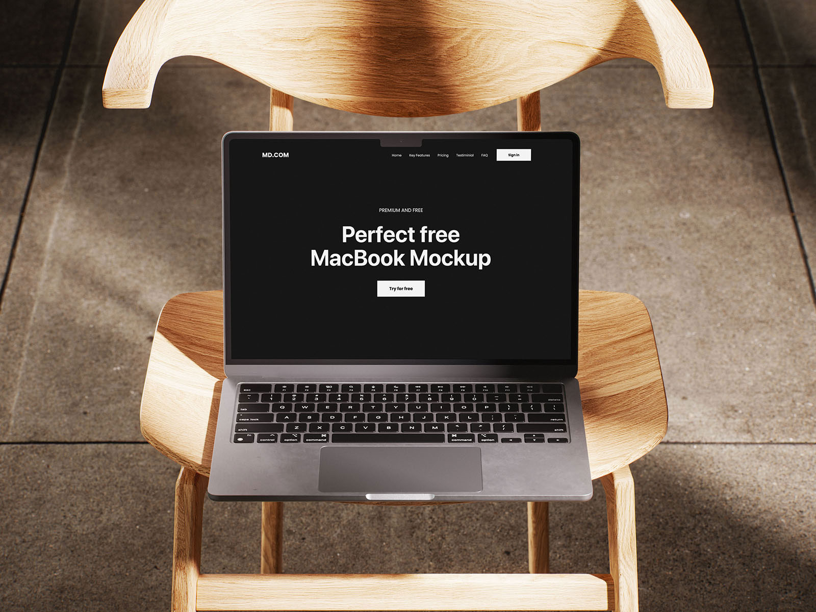 Free MacBook Mockup on Wooden Chair PSD Template