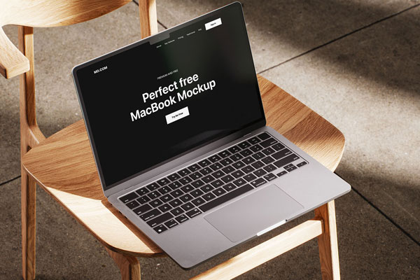 Free MacBook Mockup on Wooden Chair PSD Template
