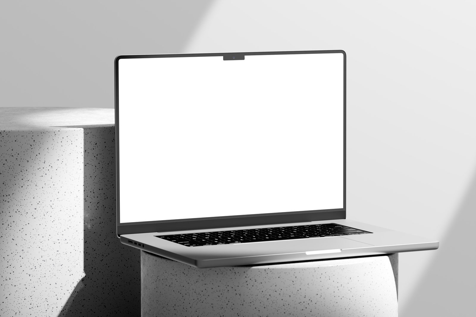 Free MacBook Pro Mockup on Round Podium PSD Template