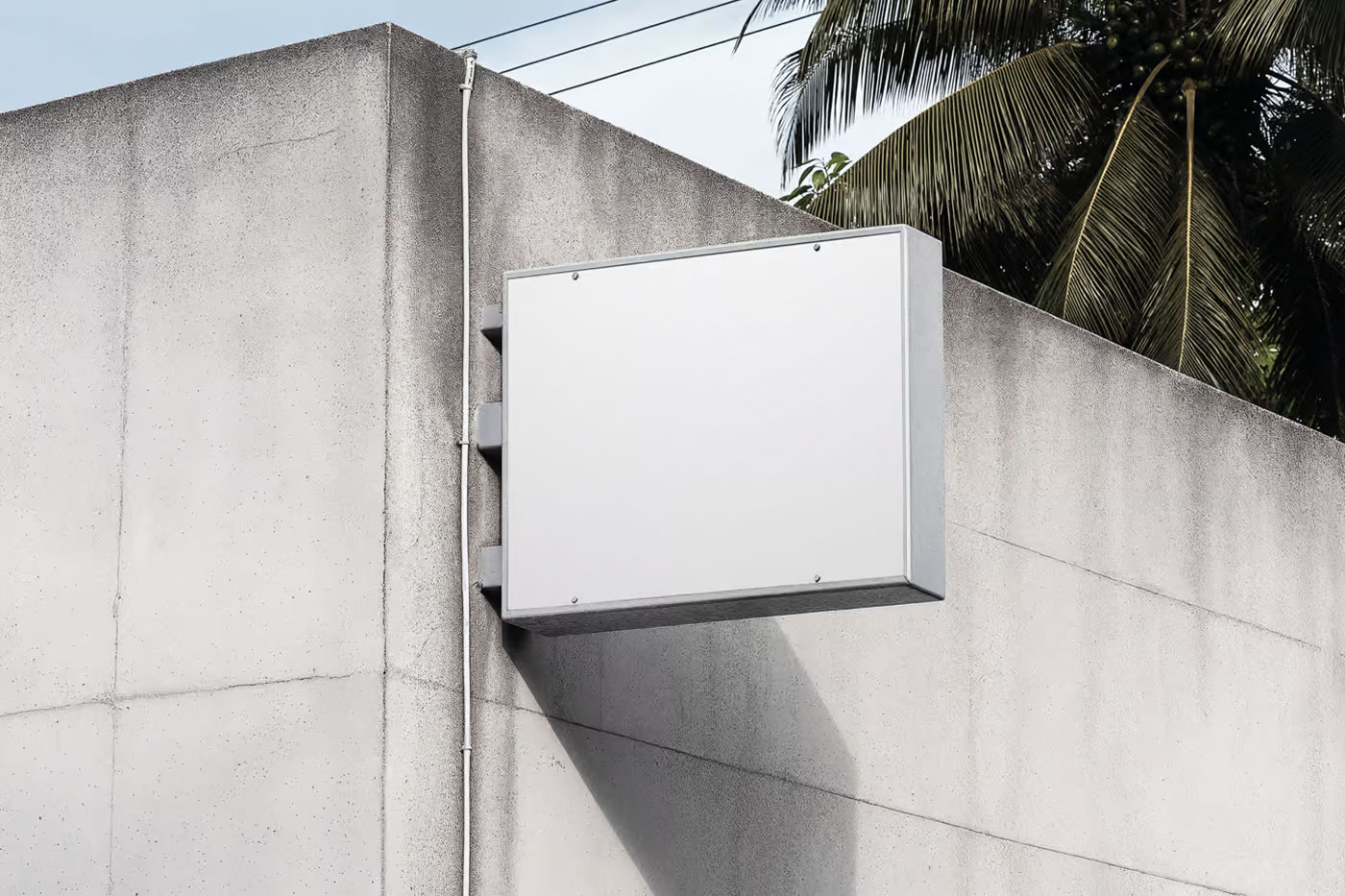 Free Rectangle Sign on Concrete Wall Mockup PSD Template