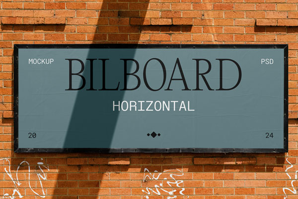 Free Small Billboard on Brick Wall Mockup PSD Template