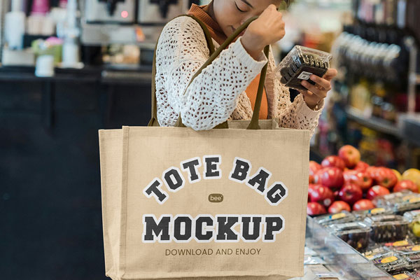 Free Tote Bag on Woman Mockup PSD Template