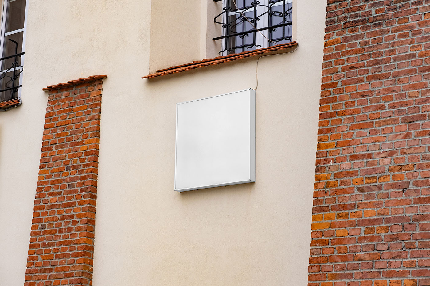 Free Square Coffer Sign on Wall Mockup PSD Template