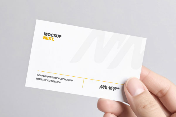 Free Business Card Holding by Hand Mockup PSD Template