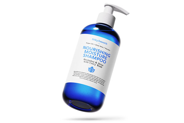 Free Cosmetic Bottle with a Pump Mockup PSD Template