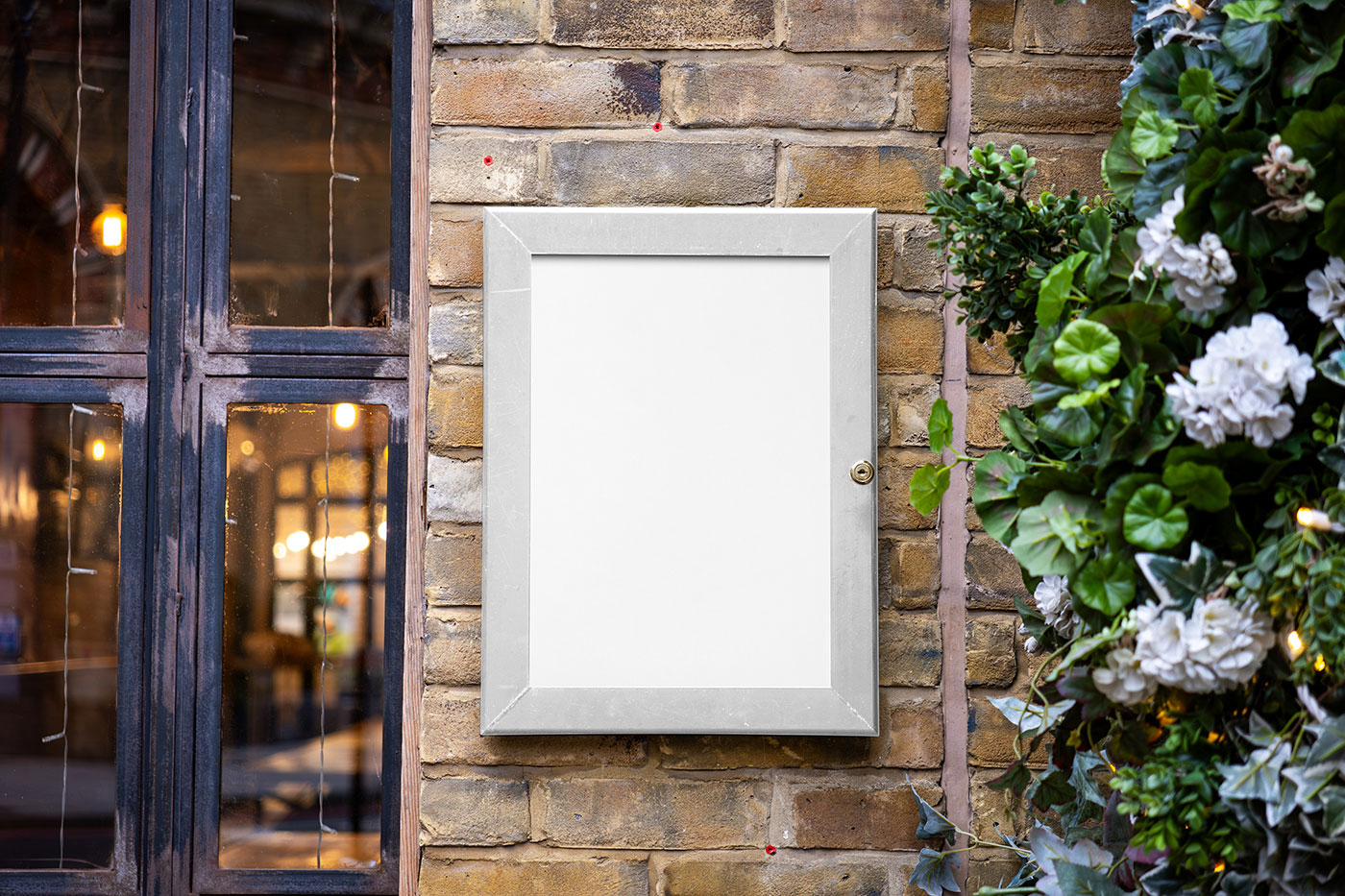 Free Menu on Brick Wall Mockup PSD Template