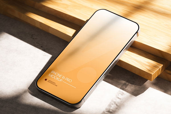 Free iPhone 16 Pro Mockup on Wood PSD Template