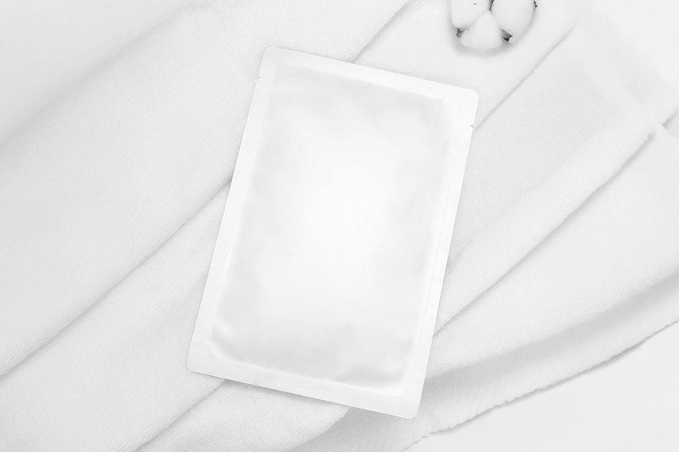 Free Lying Cosmetic Sachet Mockup PSD Template