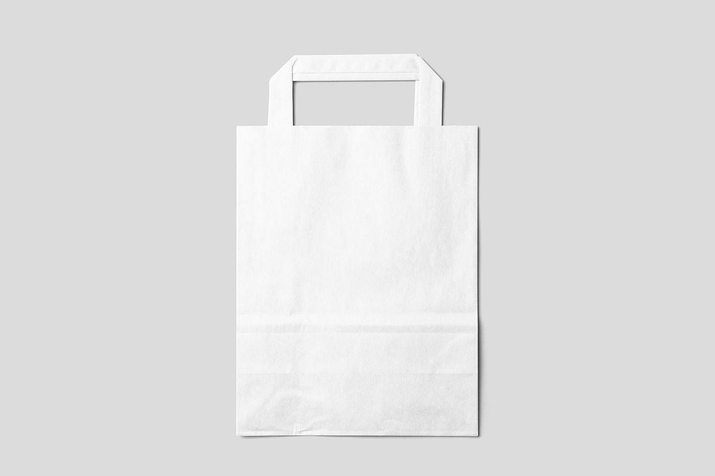 Free Lying Small Paper Bag Mockup PSD Template