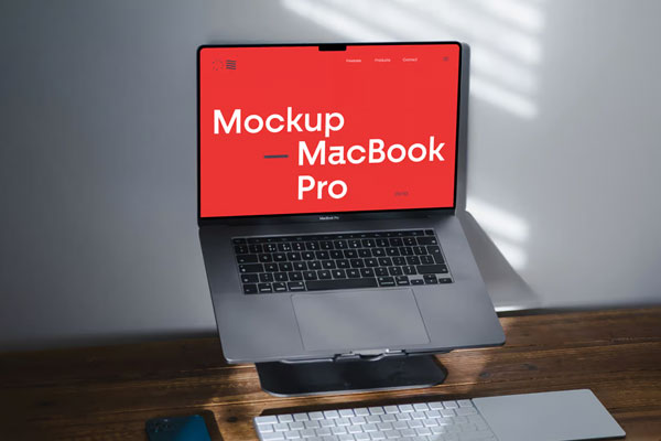 Free MacBook Pro on Stand Mockup PSD Template
