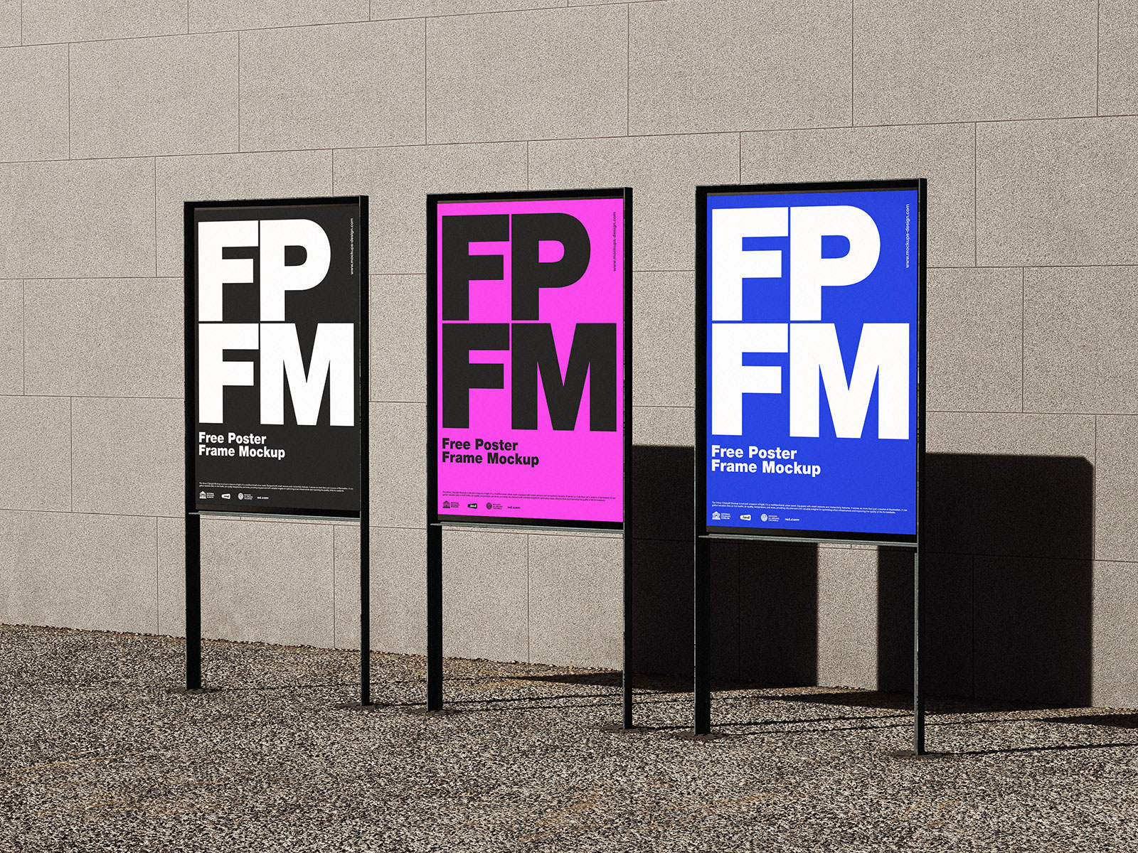Free Poster Frames Against the Wall Mockup PSD Template