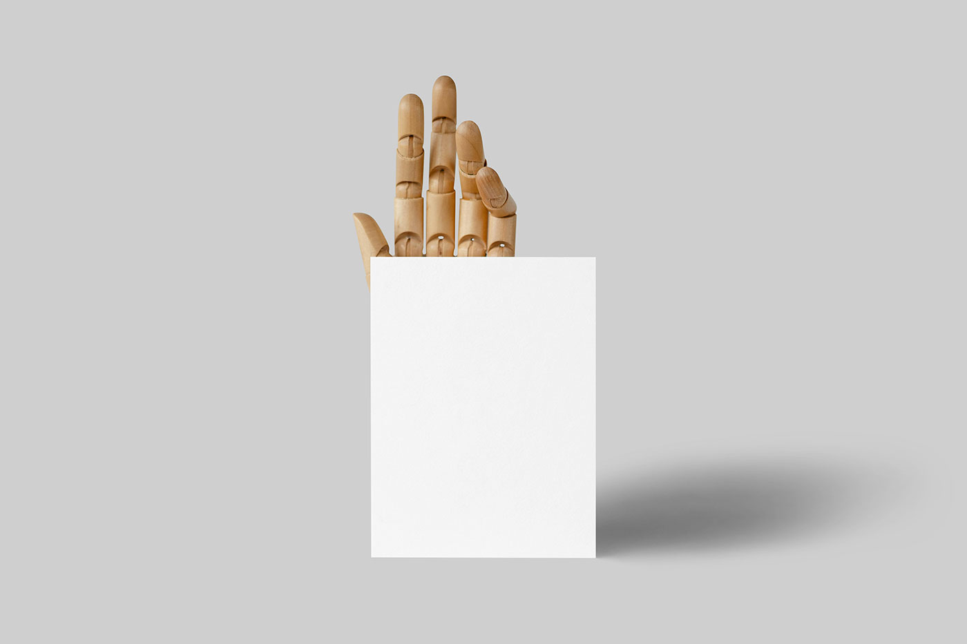 Free Card with Wooden Hand Mockup PSD Template