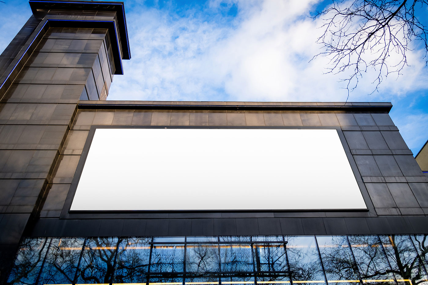 Free Billboard on Black Building Mockup PSD Template