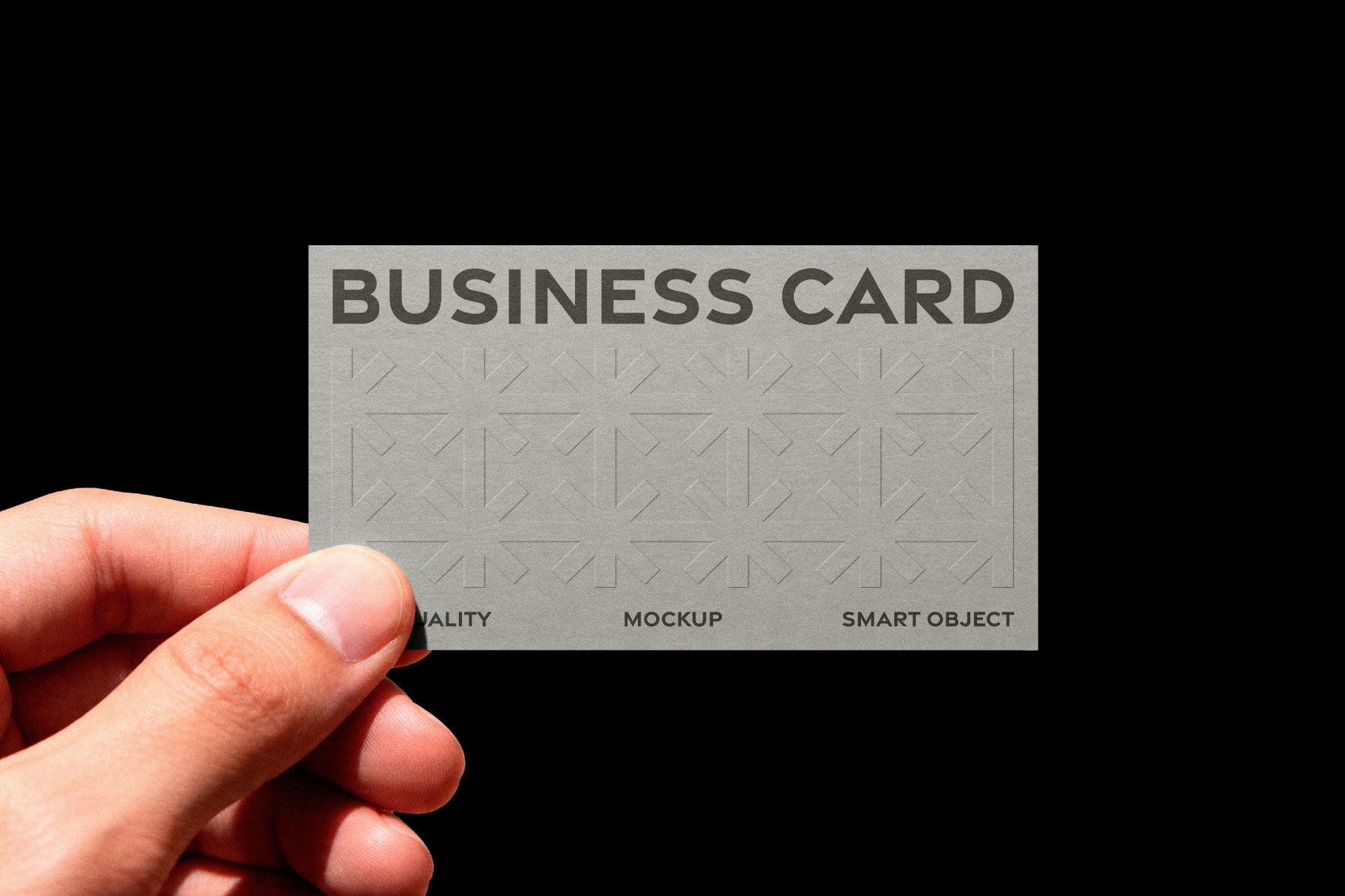 Free Embossed Business Card Mockup in Hand PSD Template